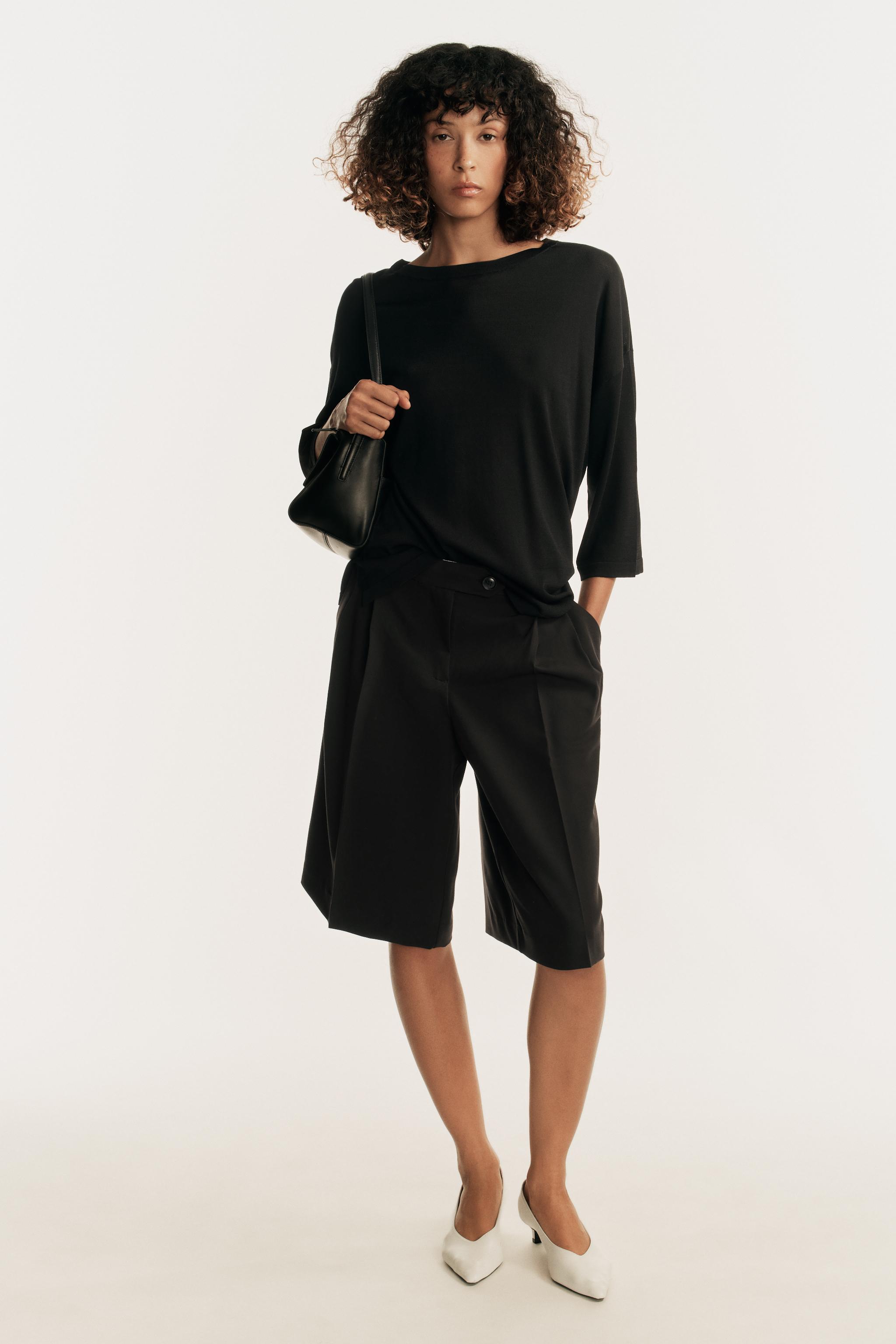 THREE-QUARTER SLEEVE KNIT TOP